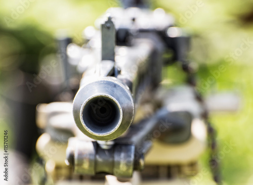 Close up photo of historical loaded machine gun, World War II photo