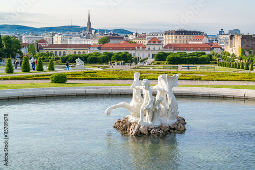 Photography Pool with baroque sculpture in Belvedere gardens and Lower Belvedere Palace in V