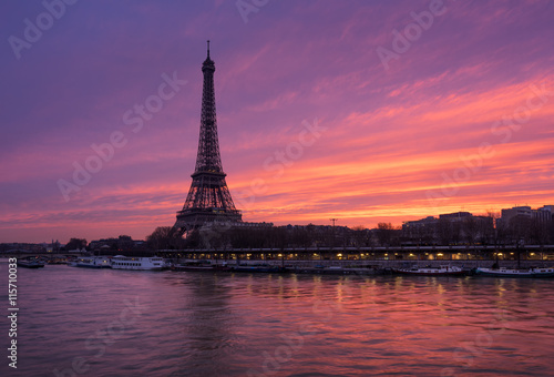 Fiery sunrise on the Eiffel Tower and Seine River in winter. Port de Suffren, Grenelle, 15th and 7th Arrondissements of Paris, France © Francois Roux