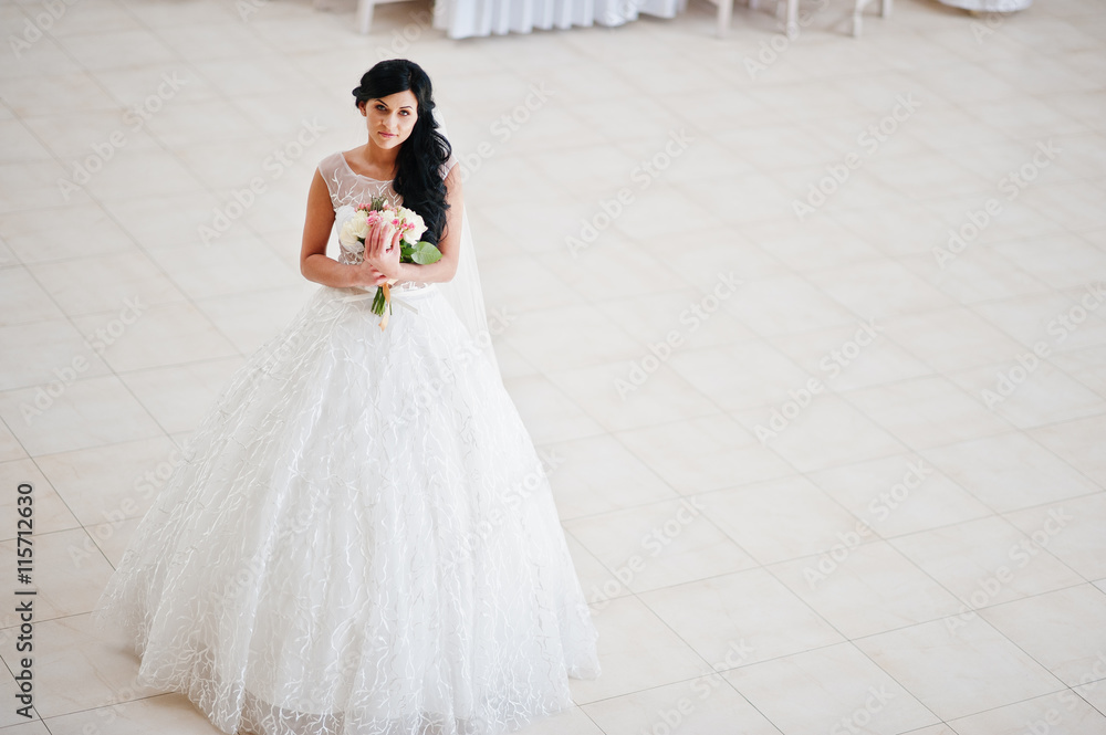 Temptation model brunette bride at exciting wedding dress with w Temptation model brunette bride at exciting wedding dress with w