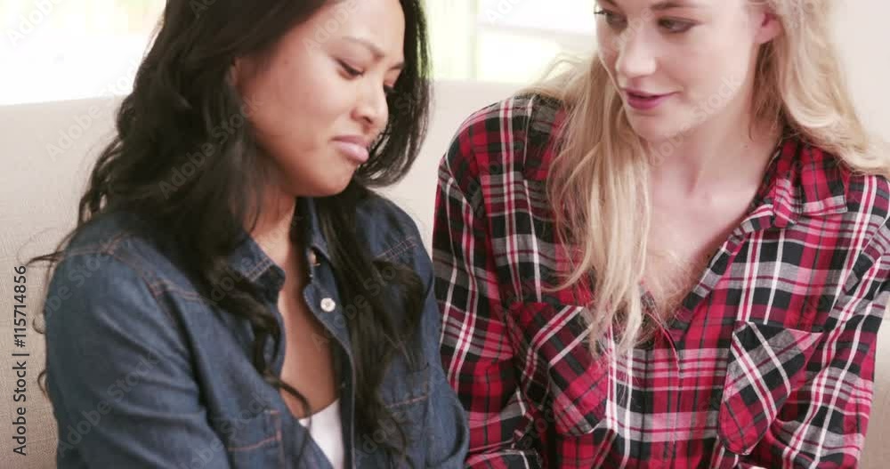Young woman comforting her friend Young woman comforting her friend