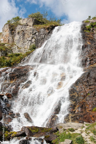 Beautiful waterfall in the Italian mountains Alps