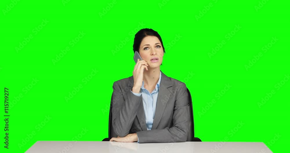 Businesswoman on a phone call on green screen Businesswoman on a phone call on green screen