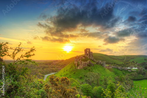 Ruins of the Corfe castle at beautiful sunrise in County Dorset  UK