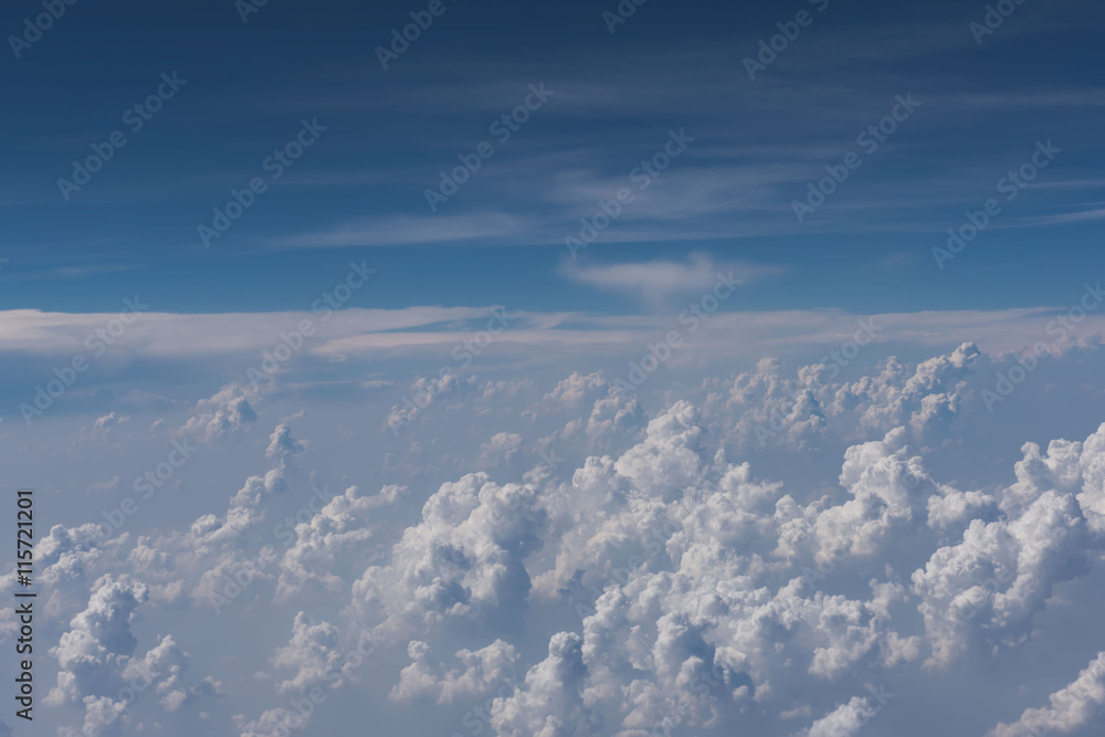 Beautiful blue sky and cloud view from an airplane window. background