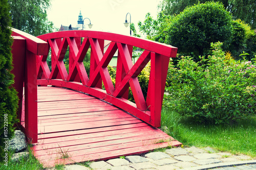 Red bridge in park