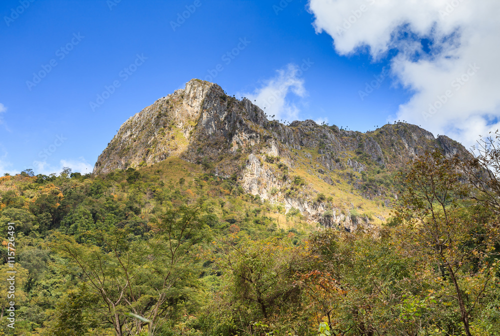 mountain peak and raining fog blue sky mountain peak and raining fog blue sky