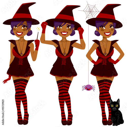 Beautiful dark sexy magical black witch with magic wand and cat