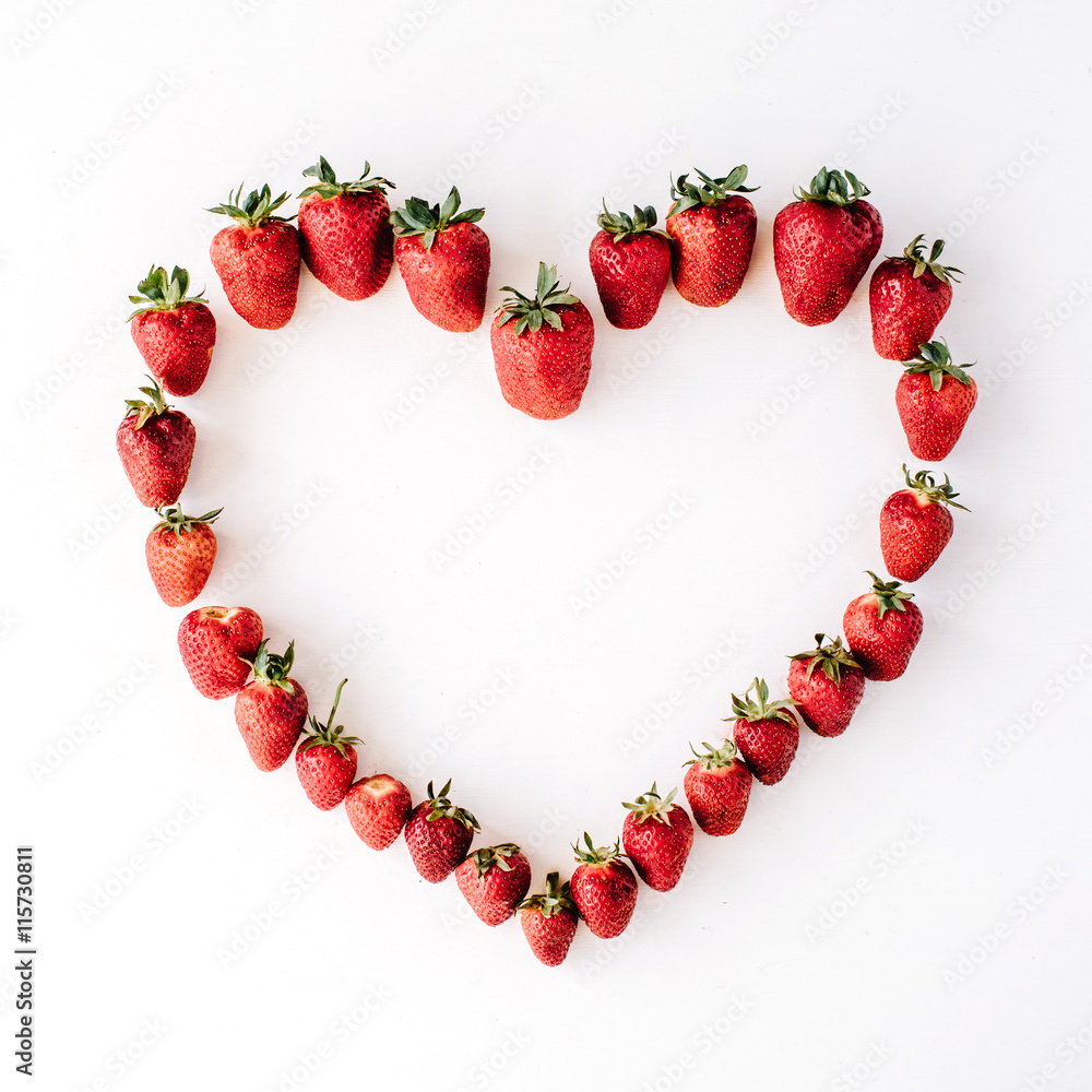 Obraz premium heart made with strawberry, flat lay