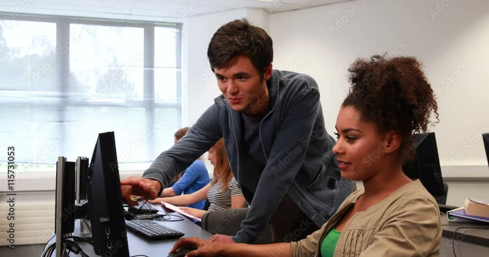Students working together in computer room Students working together in computer room
