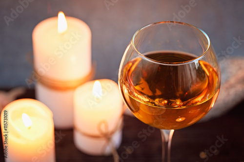 Romantic dinner with wine and candles on a table © svittlana
