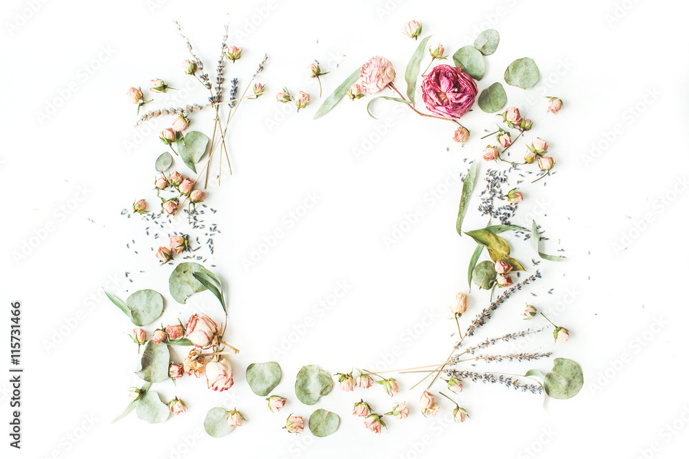 wreath frame with roses, lavender, branches, leaves and petals isolated on white background. flat lay, overhead view