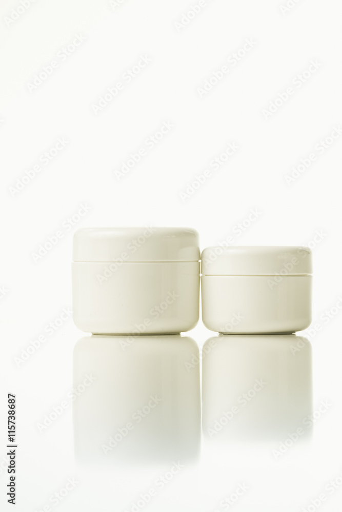 Up close - large and small cream jar Up close - large and small cream jar