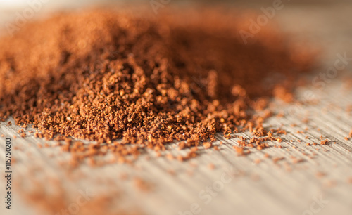ground coffee on a gray background closeup