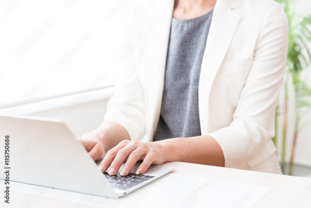 a businesswoman typing kewboard a businesswoman typing kewboard