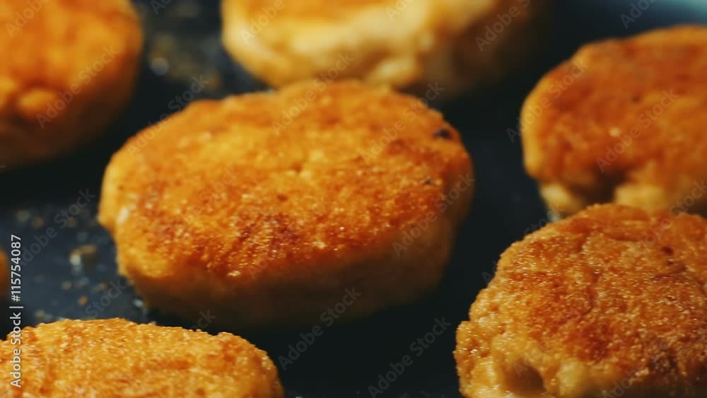 Meat cooking. Fresh juicy meat chop (cutlet) are frying in a pan. Close-up panning view. Meat cooking. Fresh juicy meat chop (cutlet) are frying in a pan. Close-up panning view.