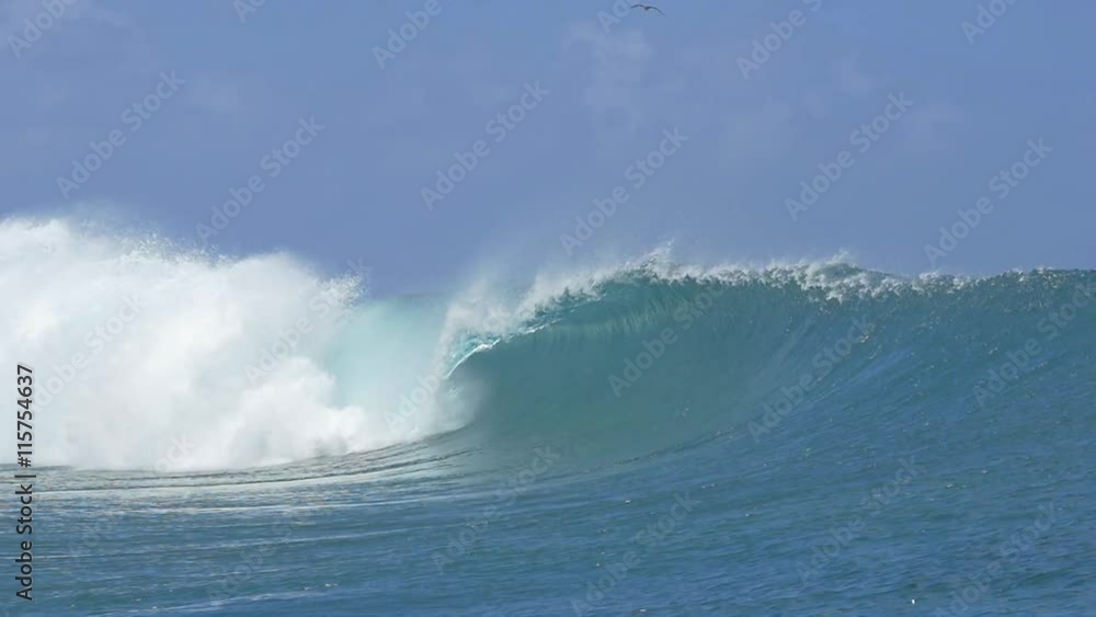 SLOW MOTION CLOSE UP: Big Teahopoo wave breaking and splashing SLOW MOTION CLOSE UP: Big Teahopoo wave breaking and splashing