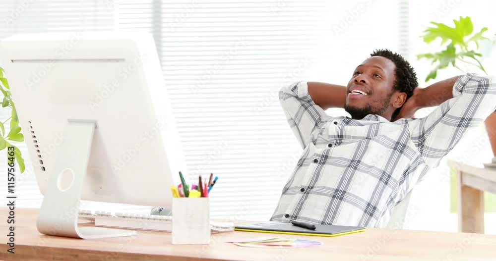 Casual businessman relaxing in his swivel chair Casual businessman relaxing in his swivel chair