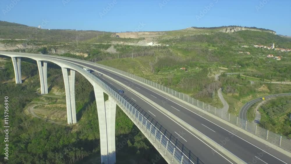 AERIAL: Cargo truck with empty container driving on the highway AERIAL: Cargo truck with empty container driving on the highway