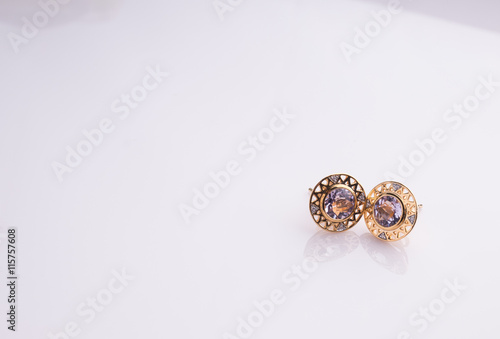 Jewel earring on white shine table