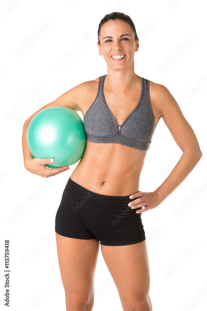 Fit Woman Standing Holding a Pilates Ball Fit Woman Standing Holding a Pilates Ball
