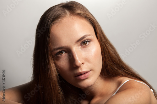 close up portrait of young beautiful caucasian brunette woman, natural beauty
