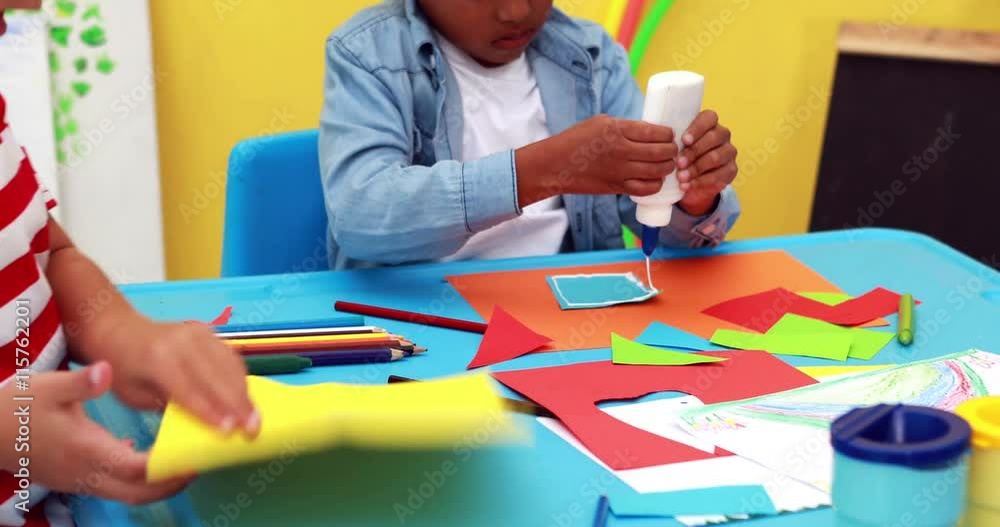 Cute little boys having art time in the classroom Cute little boys having art time in the classroom