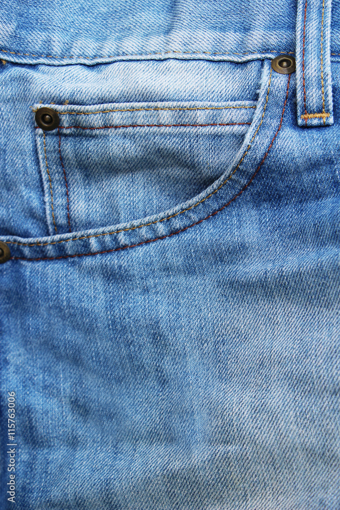 Stock Photo - Blue torn denim jeans background Stock Photo - Blue torn denim jeans background