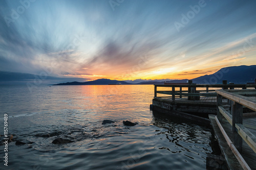 Beautiful sunset viewed from a dock in Jericho Beach  Vancouver  British Columbia  Canada.