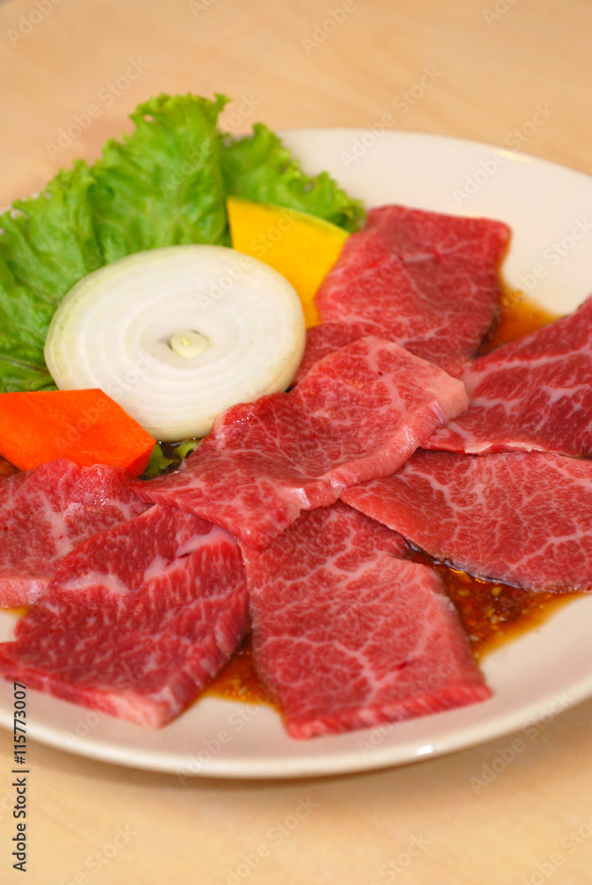 high quality premium Fresh Beef slices on white plate korean grilled menu high quality premium Fresh Beef slices on white plate korean grilled menu