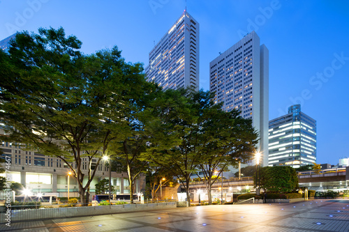 modern office buildings in downtown of tokyo at night © zhu difeng