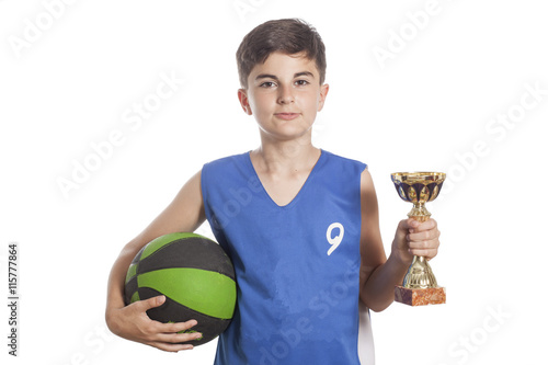 Fotografie Boy Holding Basketball And Trophy