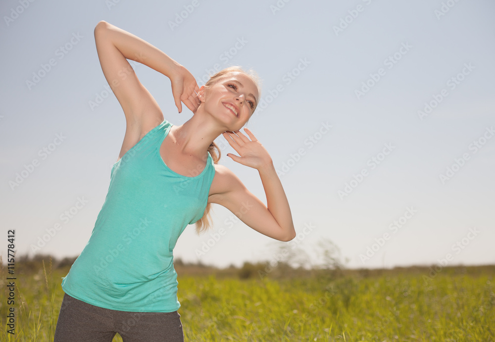 Sport blond young woman exercising in the outdoors yoga photo Sport blond young woman exercising in the outdoors yoga photo