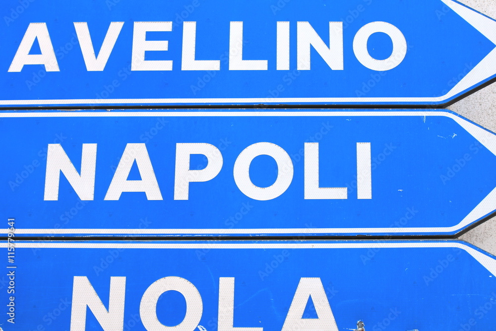 Road sign with the inscription: Avellino, Naples and Nola Road sign with the inscription: Avellino, Naples and Nola