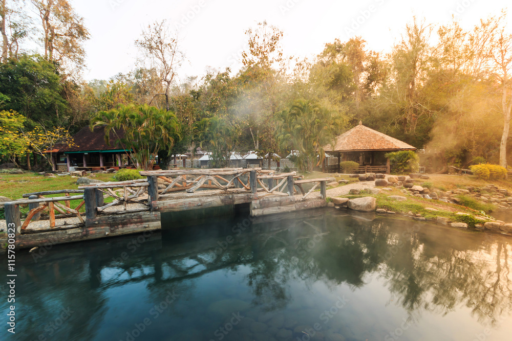 Obraz premium Wonderful morning of gold steam hot spring with sunlight at Jae Son National Park,Thailand