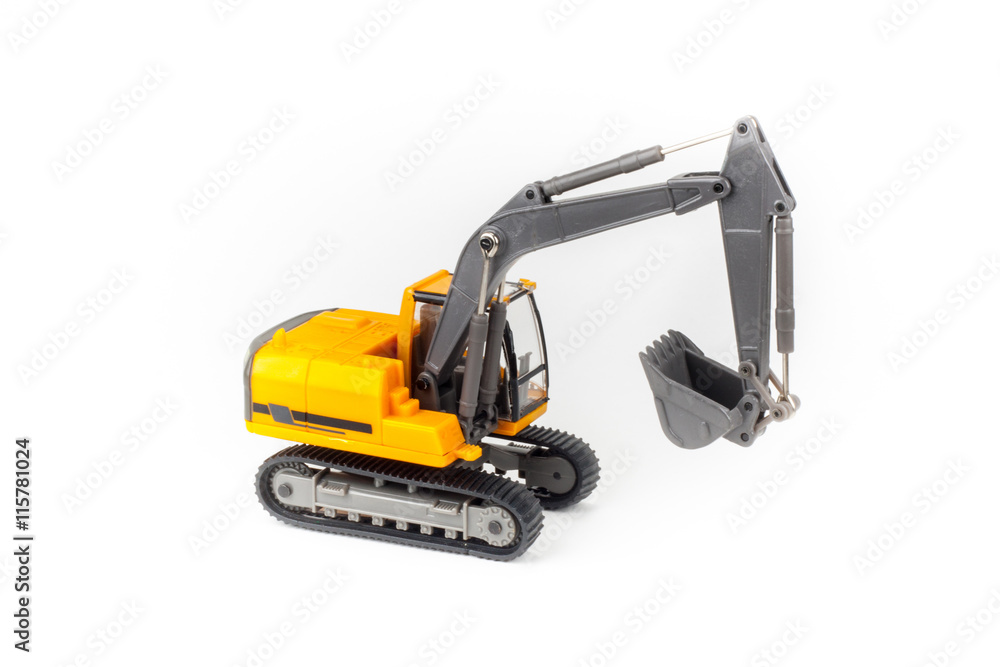 Miniature excavator isolated on white background Miniature excavator isolated on white background