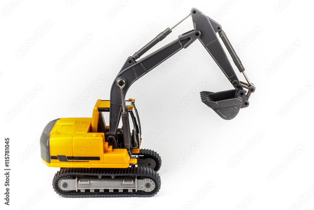 Miniature excavator isolated on white background Miniature excavator isolated on white background