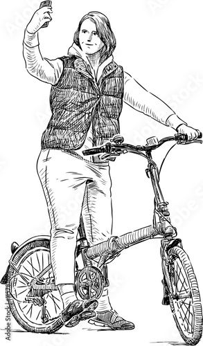 girl cyclist takes a selfie 