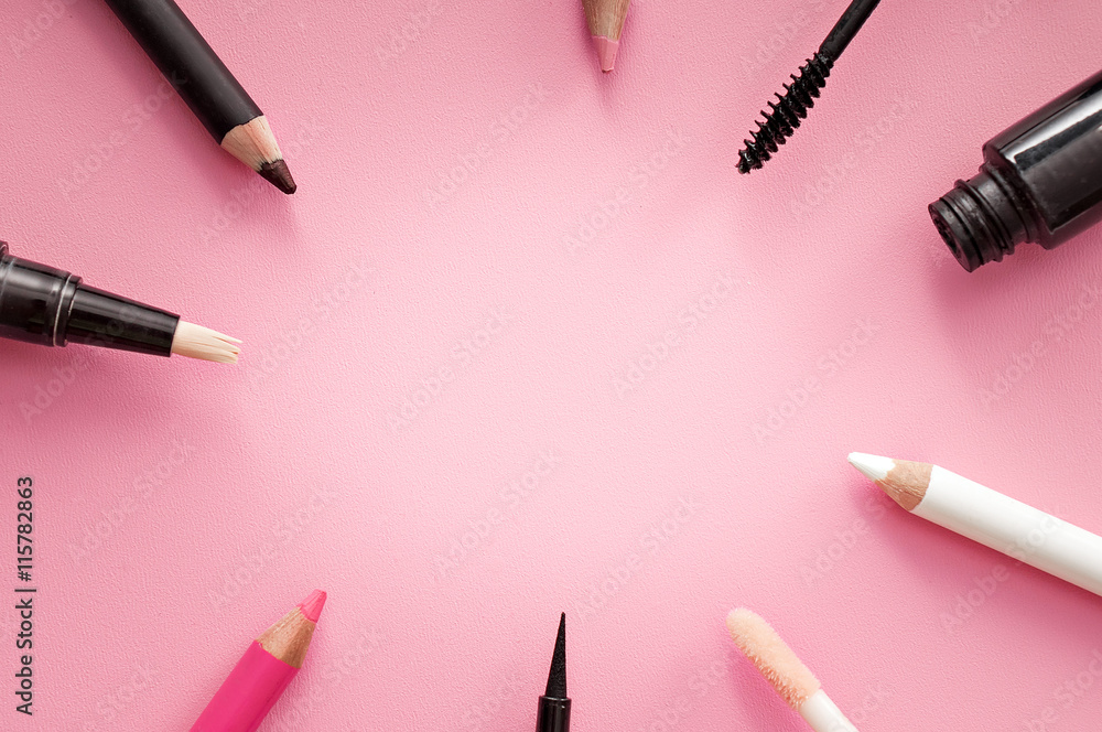 set of cosmetic products on pink background set of cosmetic products on pink background