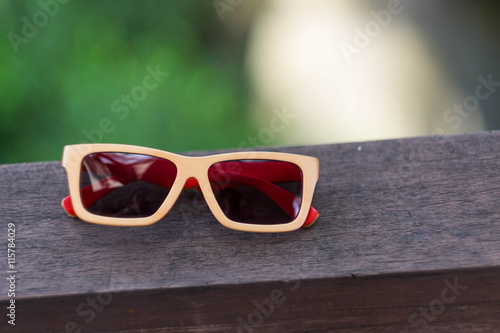 sun glasses on wood