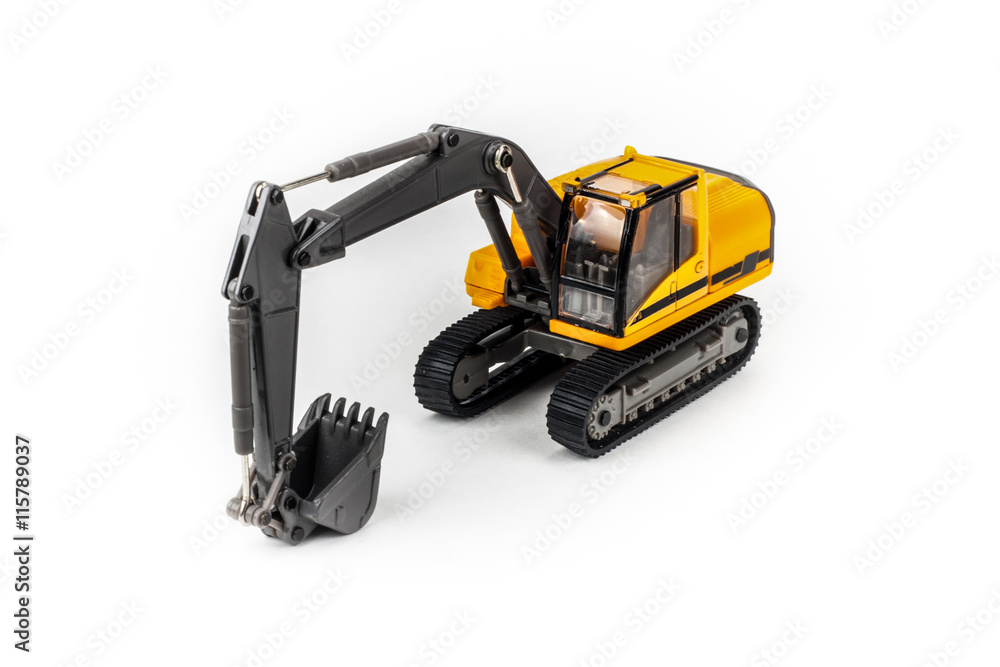 Miniature excavator isolated on white background Miniature excavator isolated on white background
