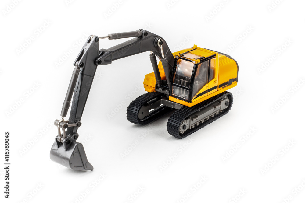 Miniature excavator isolated on white background Miniature excavator isolated on white background