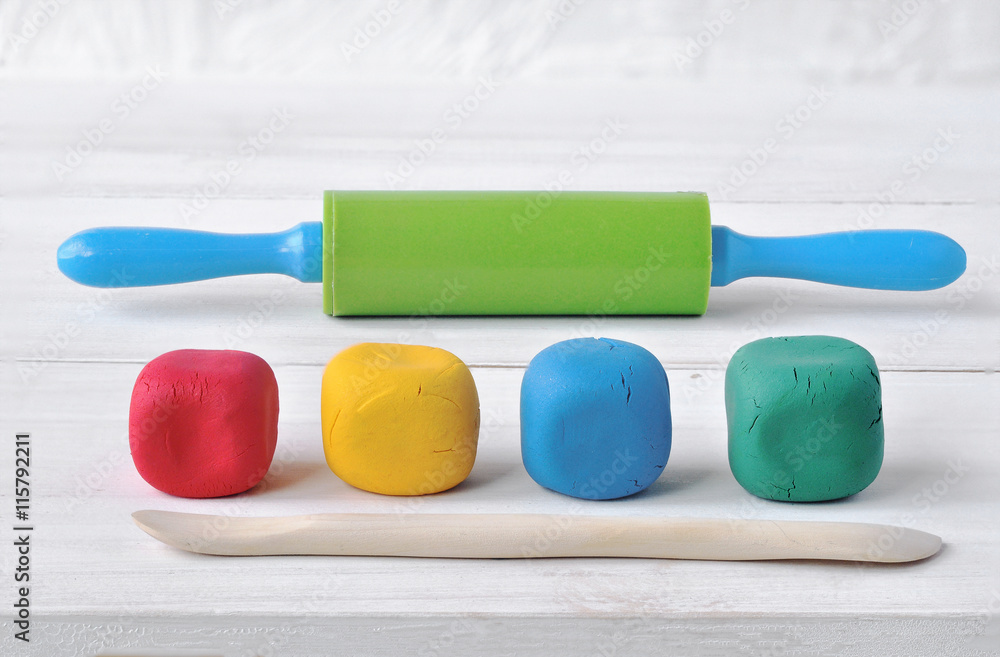 Fototapeta premium Multicolored plasticine modeling tools.