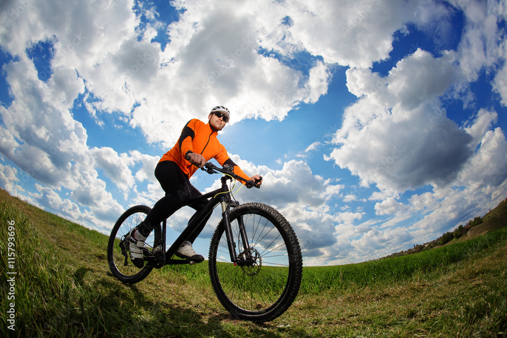 Cyclist on the Beautiful Meadow Trail Cyclist on the Beautiful Meadow Trail