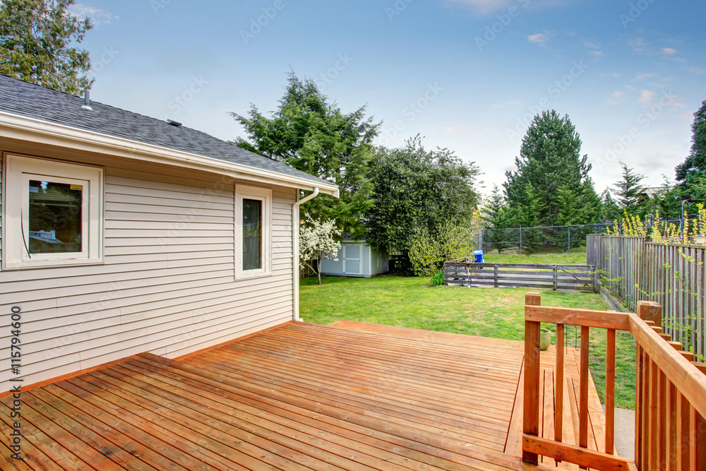 Picture of Large wooden back deck. - obrazy, fototapety, plakaty 