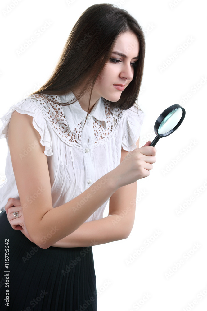Beautiful girl portrait looking through magnifier. Isolated Beautiful girl portrait looking through magnifier. Isolated