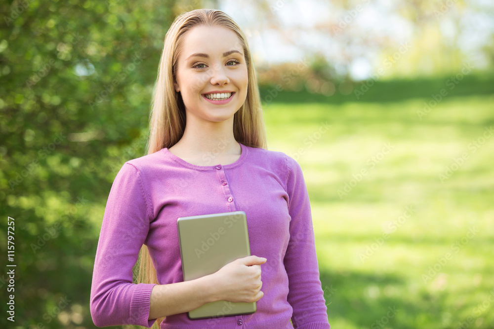Beautiful young woman at garden Beautiful young woman at garden