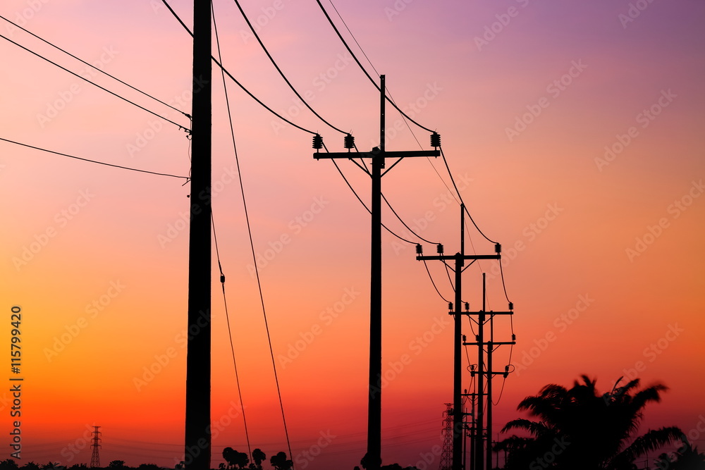Electric post and color of sky at sunset time.