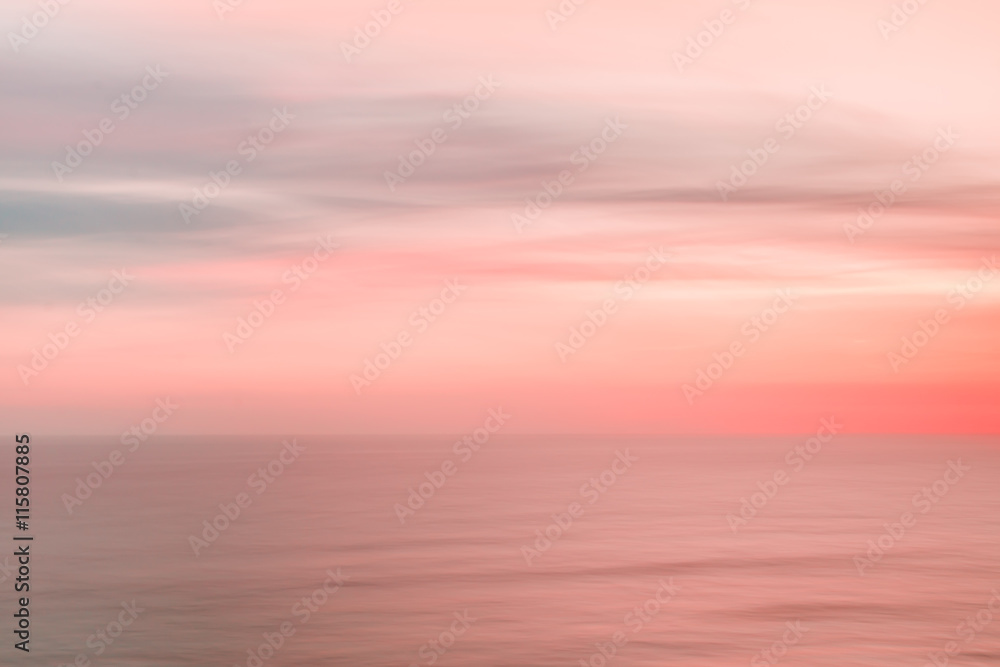 Blurred sunset sky and ocean