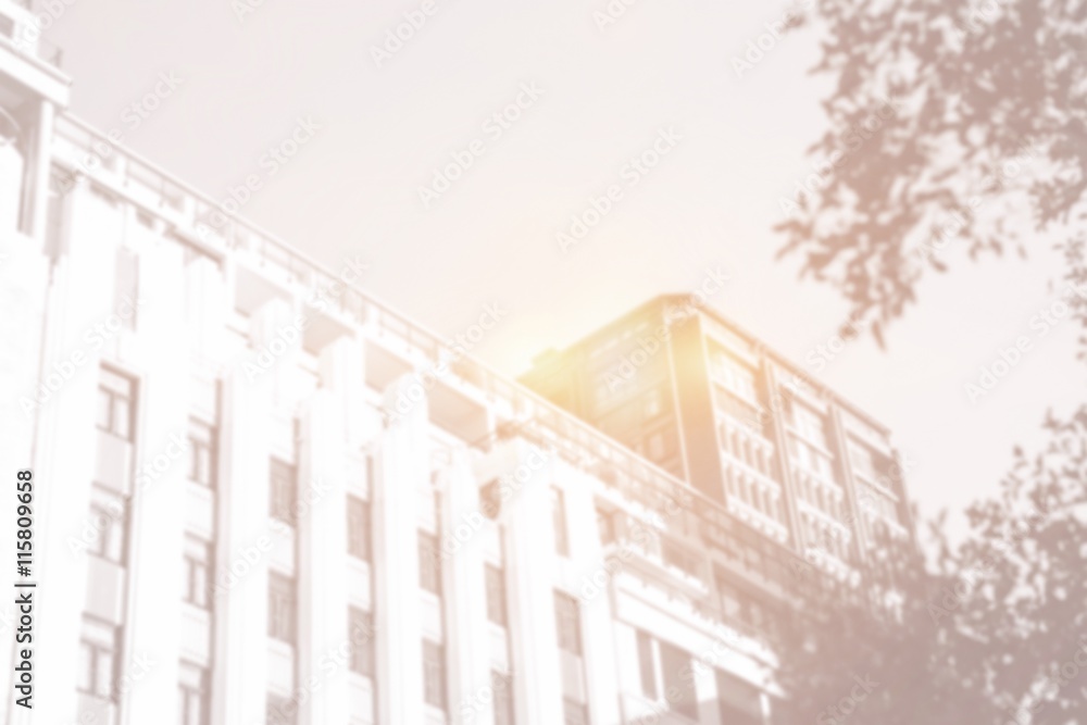 Fototapeta premium Bottom-up view of building with bright light